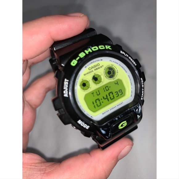 black and green g shock watch